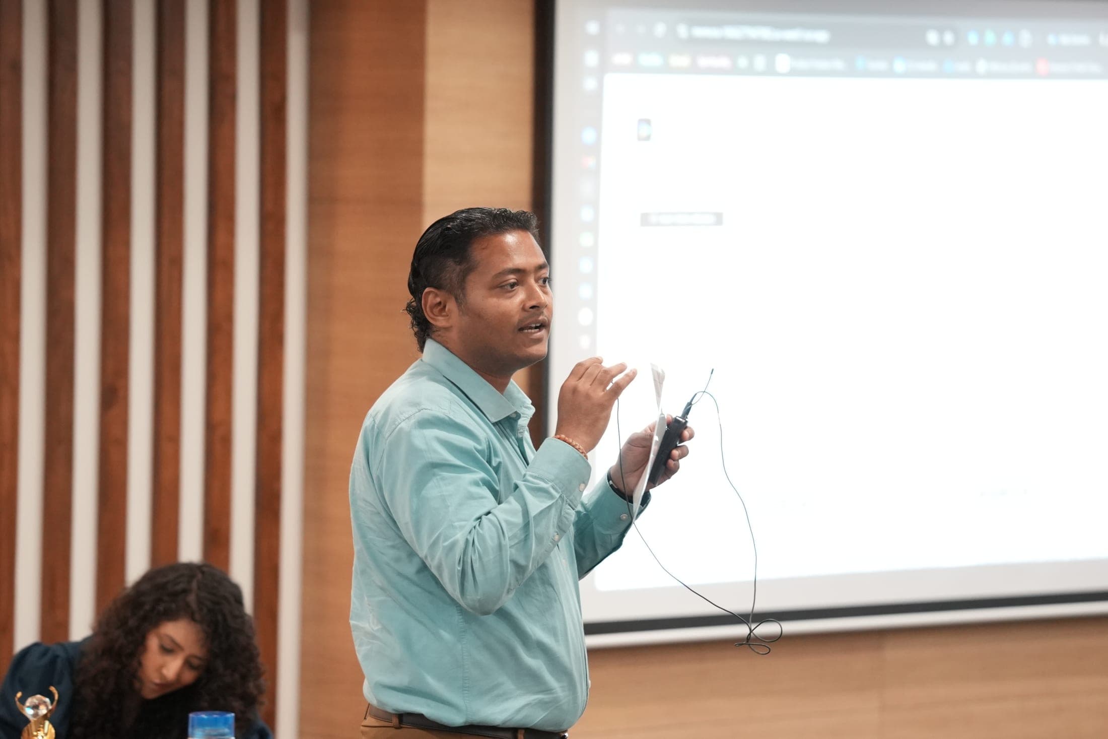 Dr Swapnil Sahoo presenting to the AI Mini Hackathon jury and participants